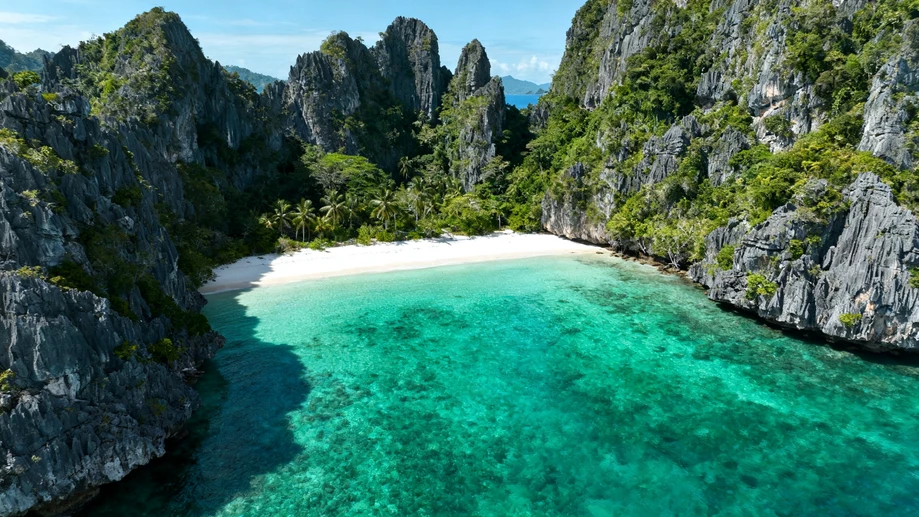 A leisurely unplanned tour of hidden turquoise lagoons tucked between jagged limestone karsts in northern Palawan the Philippines